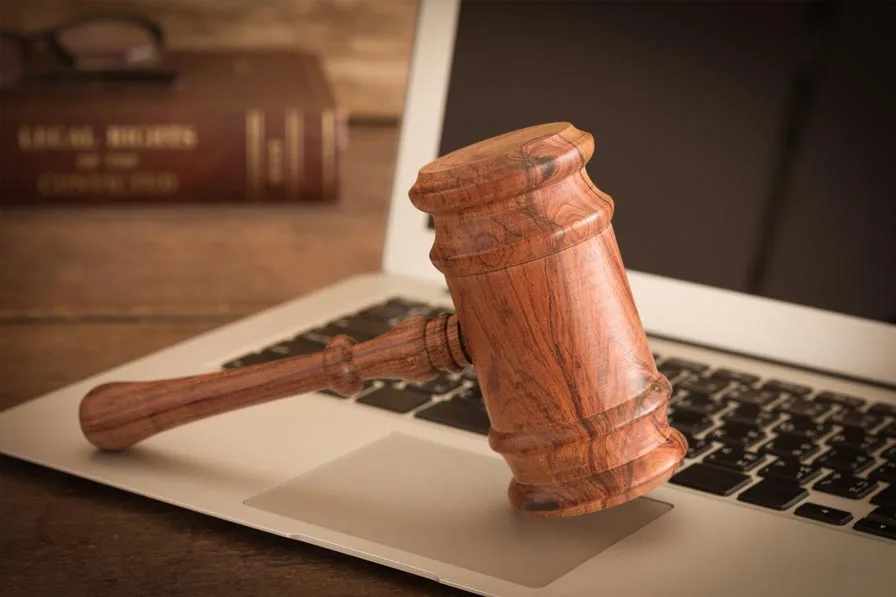 gavel on laptop